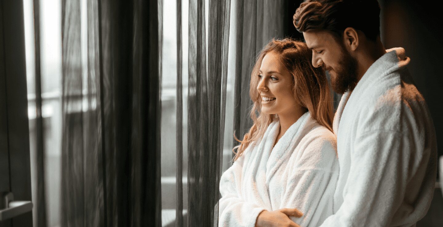 Spa weekend in Coventry - two people in robes smiling